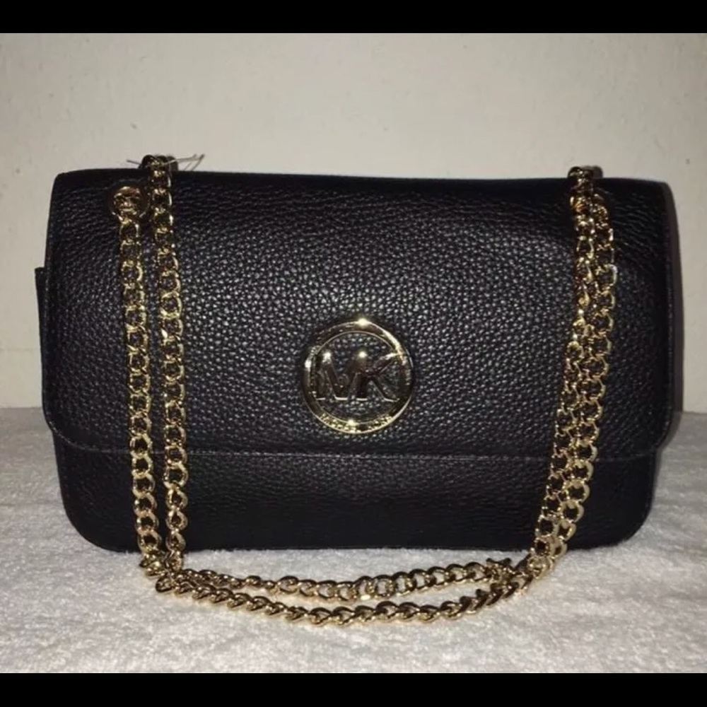 Michael kors fulton small leather flap bag.